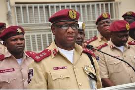 Mr Isah Seidu with other FRSC Official